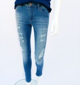 DISTRESSED SKINNY JEANS